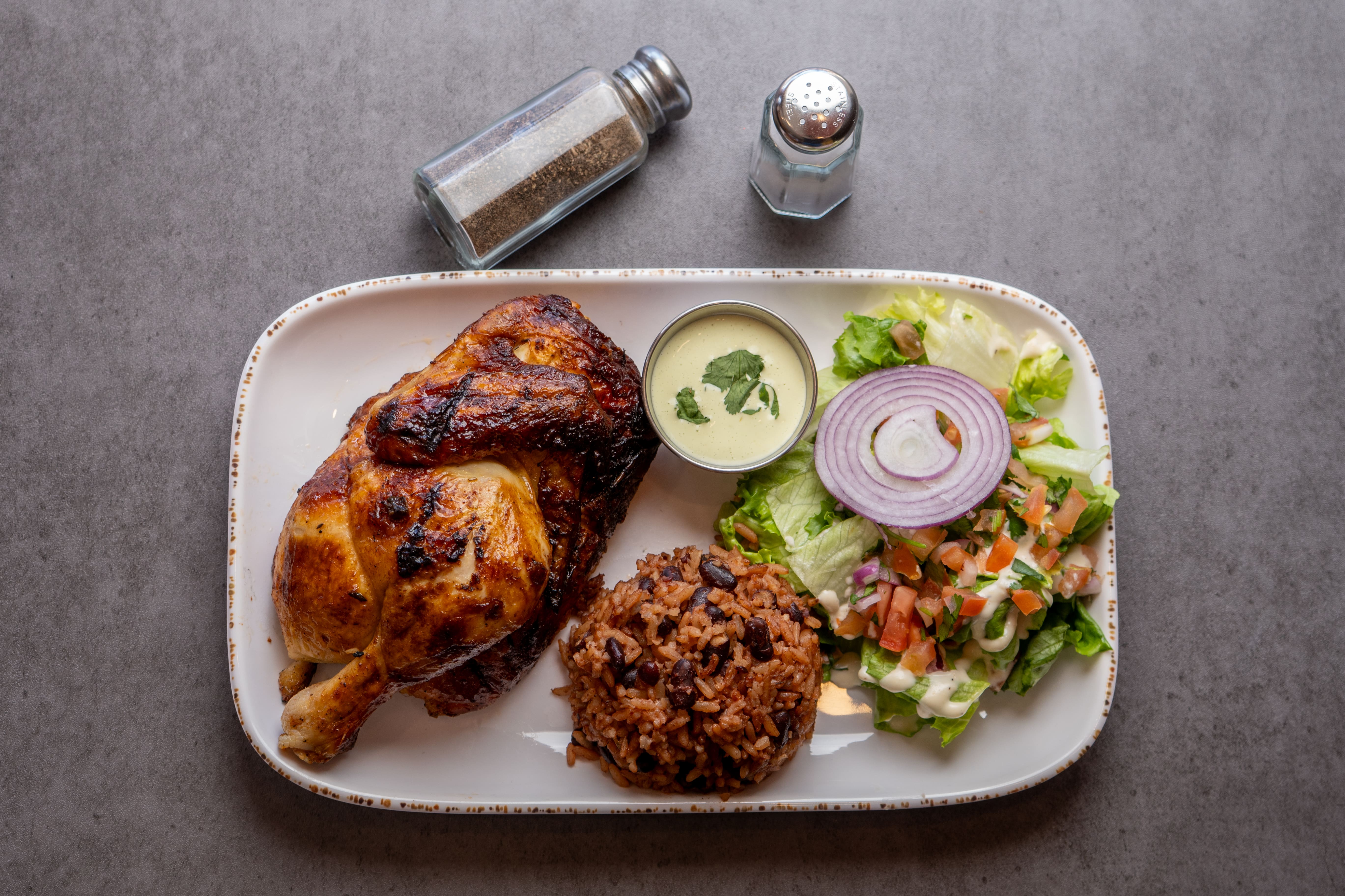 Signature grilled chicken platter with sides
